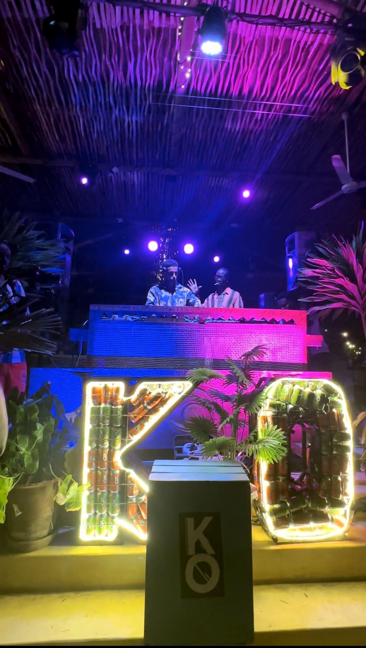 The festival's night stage lit in blue and pink